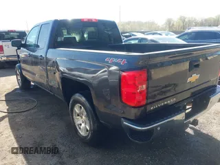 2015 Chevrolet Silverado 1500 LT with VIN 1GCVKREH4FZ256729, listed as a IAAI auction lot 41973711 with 185,791 mi miles. Bid and sale history available at carsss.com. Image 3.