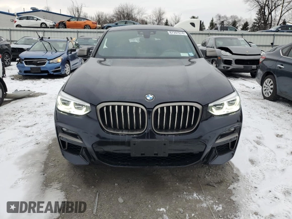 2021 BMW X4 M40i z VIN 5UX2V5C06M9F70459, wystawiony jako Copart lot #87397614 z przebiegiem 35 233 mil mil oraz Szkoda całkowita • Salvage title. Historia ofert i sprzedaży dostępna na DreamBid. Obrazek 5.
