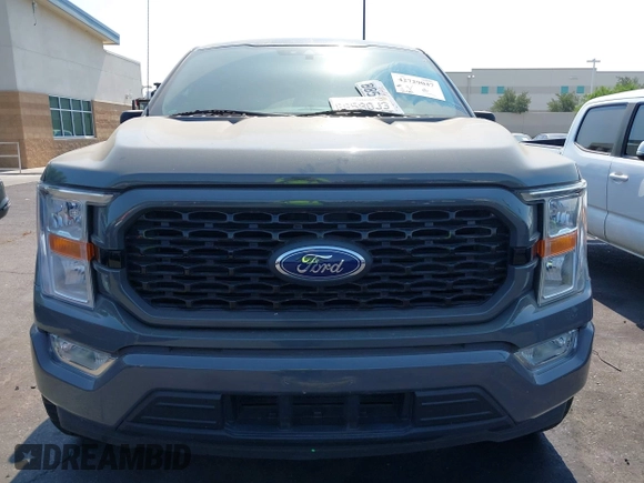 2021 Ford F-150 XL with VIN 1FTEW1CP6MFA09100, listed as a IAAI auction lot 42729047 with 27,593 mi miles and . Bid and sale history available at DreamBid. Image 12.