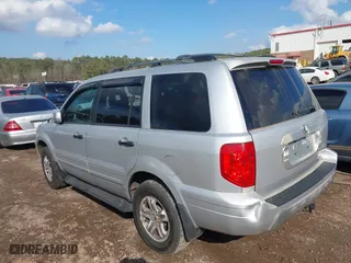 2003 Honda Pilot EX with VIN 2HKYF18693H591369, listed as a IAAI auction lot 41518617 with 325,658 mi miles. Bid and sale history available at carsss.com. Image 3.