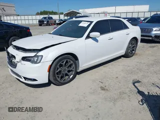 2015 Chrysler 300 with VIN 2C3CCABG9FH736013, listed as a IAAI auction lot 41646979 with 103,572 mi miles. Bid and sale history available at carsss.com. Image 17.