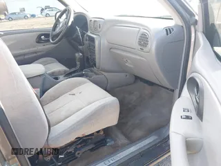 2006 Chevrolet TrailBlazer LS with VIN 1GNDT13S462249241, listed as a IAAI auction lot 41869456 with 228,053 mi miles. Bid and sale history available at carsss.com. Image 5.