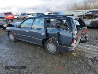 1993 Subaru Legacy L with VIN 4S3BJ6331P7949959, listed as a Copart auction lot 88360485 with 125,562 mi miles and Salvage Title. Bid and sale history available at DreamBid. Image 2.