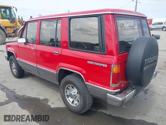 1991 Isuzu Trooper z VIN JACCH58R0M7904092, wystawiony jako IAAI lot #41900283 z przebiegiem 226 780 mil mil oraz . Historia ofert i sprzedaży dostępna na DreamBid. Obrazek 3.