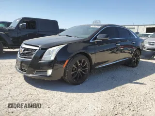 2016 Cadillac XTS Luxury Collection with VIN 2G61N5S37G9197536, listed as a Copart auction lot 52705785 with 143,434 mi miles and Salvage title. Bid and sale history available at DreamBid. Image 1.