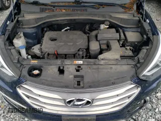 2017 Hyundai Santa Fe 2.4L z VIN 5XYZUDLB5HG483135, wystawiony jako Copart lot #55426735 z przebiegiem 93 470 mil mil oraz Szkoda całkowita • Salvage title. Historia ofert i sprzedaży dostępna na DreamBid. Obrazek 12.