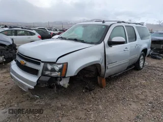 2012 Chevrolet Suburban LT with VIN 1GNSKJE7XCR174695, listed as a Copart auction lot 48224135 with 167,935 mi miles and Salvage Title. Bid and sale history available at carsss.com. Image 1.