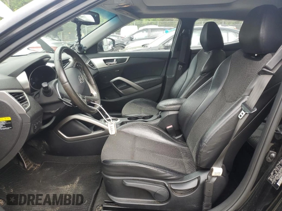 2013 Hyundai Veloster w/Gray Int z VIN KMHTC6AD2DU106887, wystawiony jako Copart lot #58149635 z przebiegiem 159 914 mil mil oraz Szkoda całkowita • Salvage title. Historia ofert i sprzedaży dostępna na DreamBid. Obrazek 7.