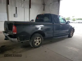 1999 Ford F-150 with VIN 1FTZX1723XNA24144, listed as a Copart auction lot 58071155 with 320,829 mi miles and Salvage title. Bid and sale history available at DreamBid. Image 3.