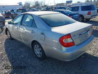 2004 Toyota Camry LE with VIN 4T1BE32K34U819587, listed as a IAAI auction lot 41236808 with 181,377 mi miles and . Bid and sale history available at DreamBid. Image 3.