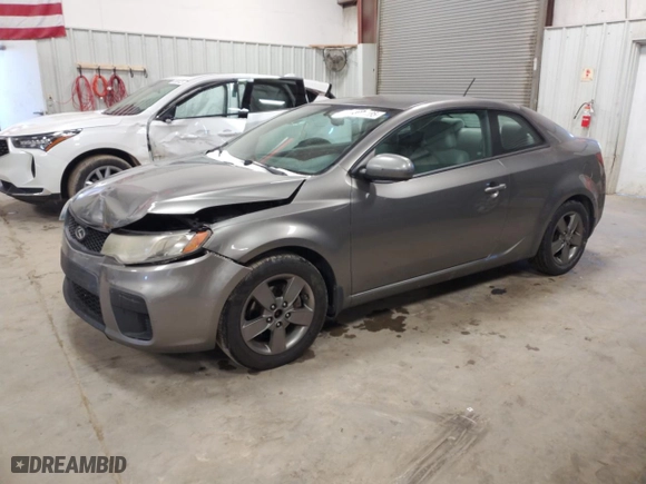 2012 Kia Forte Koup EX with VIN KNAFU6A2XC5504321, listed as a Copart auction lot 45986185 with 321,489 mi miles and Salvage Title. Bid and sale history available at carsss.com. Image 1.