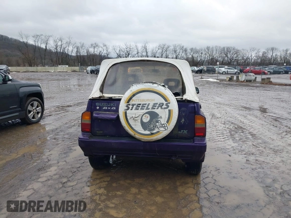 1993 Suzuki Sidekick z VIN 2S3TA01C4P6406238, wystawiony jako IAAI lot #41469419 z przebiegiem 126 667 mil mil oraz . Historia ofert i sprzedaży dostępna na DreamBid. Obrazek 16.