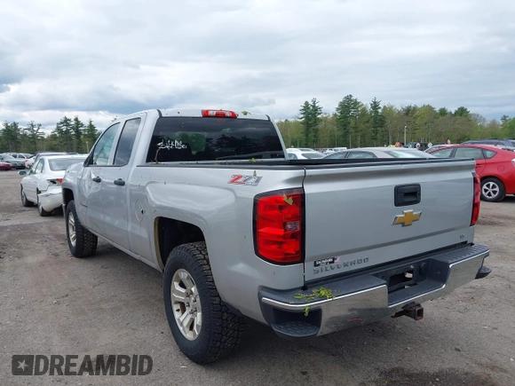 2014 Chevrolet Silverado 1500 LT with VIN 1GCVKREC8EZ151534, listed as a IAAI auction lot 42221023 with 216,835 mi miles and . Bid and sale history available at DreamBid. Image 3.