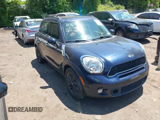 2012 MINI Countryman S z VIN WMWZC5C51CWL59956, wystawiony jako IAAI lot #42417954 z przebiegiem 79 732 mil mil oraz . Historia ofert i sprzedaży dostępna na DreamBid. Obrazek 1.