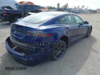 2021 Tesla Model S Long Range with VIN 5YJSA1E51MF442874, listed as a IAAI auction lot 39406495 with 36,127 mi miles and . Bid and sale history available at DreamBid. Image 4.