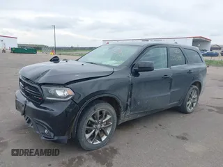 2014 Dodge Durango SXT with VIN 1C4RDJAG1EC552075, listed as a IAAI auction lot 42292301 with 122,427 mi miles and . Bid and sale history available at DreamBid. Image 17.