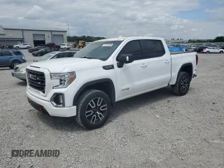 2021 GMC Sierra 1500 AT4 with VIN 3GTP9EEDXMG372685, listed as a Copart auction lot 57124285 with 128,293 mi miles and Salvage title. Bid and sale history available at DreamBid. Image 1.