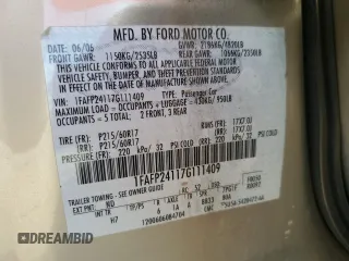 2007 Ford Five Hundred SEL z VIN 1FAFP24117G111409, wystawiony jako Copart lot #61403575 z przebiegiem Nie podano mil oraz Szkoda całkowita • Salvage title. Historia ofert i sprzedaży dostępna na DreamBid. Obrazek 12.