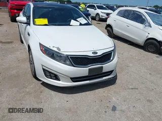 2015 Kia Optima SX Turbo z VIN 5XXGR4A68FG411149, wystawiony jako IAAI lot #42451249 z przebiegiem 246 125 mil mil oraz . Historia ofert i sprzedaży dostępna na DreamBid. Obrazek 1.