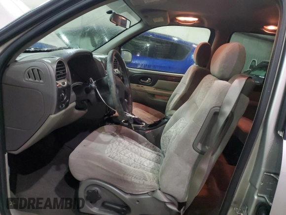2004 GMC Envoy SLE with VIN 1GKDS13S842386292, listed as a Copart auction lot 45665935 with 79,778 mi miles and Salvage Title. Bid and sale history available at carsss.com. Image 7.