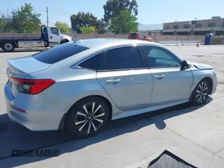 2022 Honda Civic Sedan EX with VIN 2HGFE1F77NH309152, listed as a IAAI auction lot 42013565 with 25,474 mi miles. Bid and sale history available at carsss.com. Image 4.