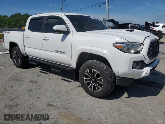 2020 Toyota Tacoma SR5 with VIN 3TMCZ5AN9LM296891, listed as a Copart auction lot 56047625 with 74,301 mi miles and Salvage title. Bid and sale history available at DreamBid. Image 4.