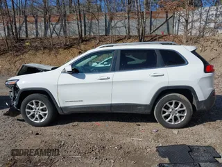 2015 Jeep Cherokee Latitude with VIN 1C4PJMCS7FW503594, listed as a IAAI auction lot 41792820 with 77,325 mi miles. Bid and sale history available at carsss.com. Image 14.