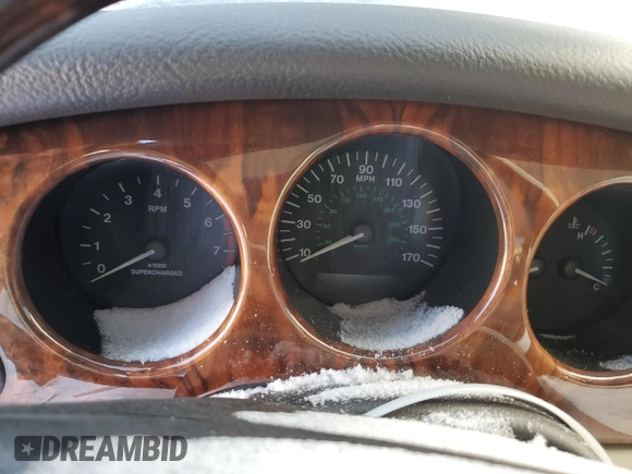 1999 Jaguar XJ with VIN SAJPD1841XC869913, listed as a Copart auction lot 41449445 with Not provided miles and Salvage title. Bid and sale history available at DreamBid. Image 9.