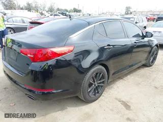 2011 Kia Optima LX with VIN KNAGM4A78B5117530, listed as a IAAI auction lot 42047302 with 171,168 mi miles. Bid and sale history available at carsss.com. Image 4.