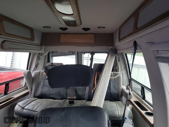 2010 Ford Econoline Cargo with VIN 1FDNE2EL2ADA03669, listed as a Copart auction lot 50614265 with 6,249 mi miles and Salvage title. Bid and sale history available at DreamBid. Image 10.