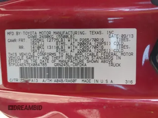 2014 Toyota Tacoma with VIN 5TFUU4EN7EX084785, listed as a IAAI auction lot 41879329 with 133,216 mi miles and . Bid and sale history available at DreamBid. Image 9.