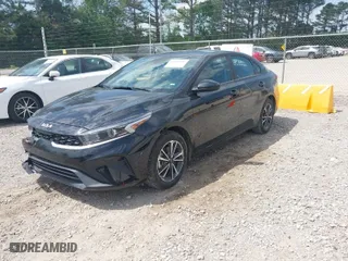 2024 Kia Forte LXS with VIN 3KPF24AD5RE748194, listed as a IAAI auction lot 42011387 with 32,543 mi miles. Bid and sale history available at carsss.com. Image 2.
