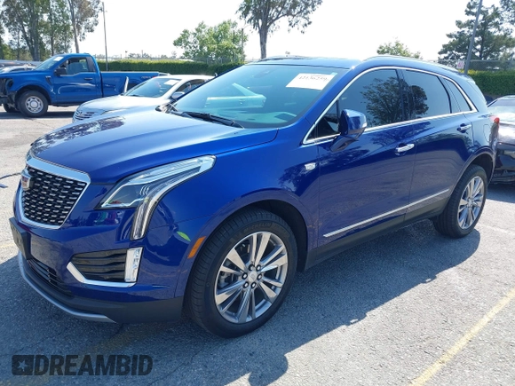 2023 Cadillac XT5 FWD Premium Luxury z VIN 1GYKNCRS3PZ176654, wystawiony jako IAAI lot #42136259 z przebiegiem 20 403 mil mil oraz . Historia ofert i sprzedaży dostępna na DreamBid. Obrazek 18.
