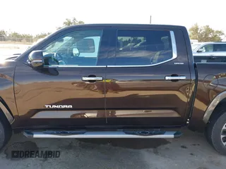 2023 Toyota Tundra Limited Hybrid with VIN 5TFJC5DB7PX032210, listed as a IAAI auction lot 41667443 with 18,390 mi miles and . Bid and sale history available at DreamBid. Image 14.