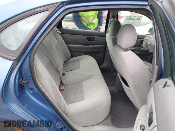 2004 Ford Taurus SE with VIN 1FAFP53U74A140294, listed as a IAAI auction lot 41630953 with Not Provided miles and . Bid and sale history available at DreamBid. Image 8.