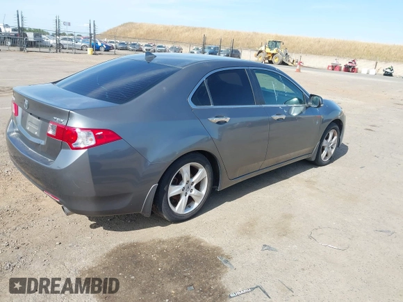 2009 Acura TSX z VIN JH4CU26629C010046, wystawiony jako IAAI lot #42303097 z przebiegiem 157 720 mil mil oraz . Historia ofert i sprzedaży dostępna na DreamBid. Obrazek 4.