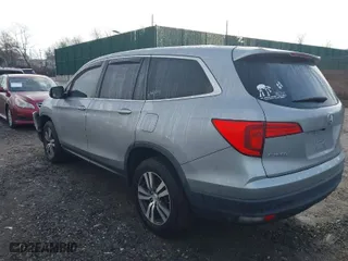 2018 Honda Pilot EX-L with VIN 5FNYF6H59JB026068, listed as a IAAI auction lot 41458049 with 128,769 mi miles. Bid and sale history available at carsss.com. Image 3.