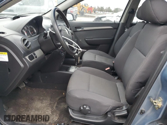 2007 Chevrolet Aveo LS z VIN KL1TD56607B126715, wystawiony jako Copart lot #85206134 z przebiegiem 85 420 mil mil oraz Szkody całkowita. Historia ofert i sprzedaży dostępna na DreamBid. Obrazek 7.