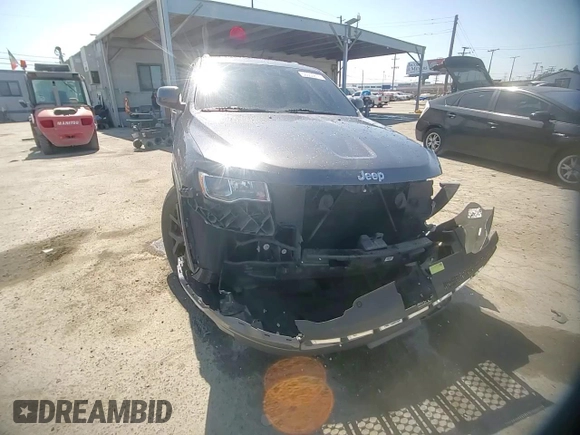 2018 Jeep Grand Cherokee Laredo E with VIN 1C4RJEAG9JC397382, listed as a Copart auction lot 56550815 with 72,239 mi miles and Salvage title. Bid and sale history available at DreamBid. Image 14.