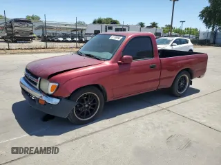 1999 Toyota Tacoma z VIN 4TANL42N9XZ513553, wystawiony jako Copart lot #57186995 z przebiegiem 228 676 mil mil oraz Szkoda całkowita • Salvage title. Historia ofert i sprzedaży dostępna na DreamBid. Obrazek 1.