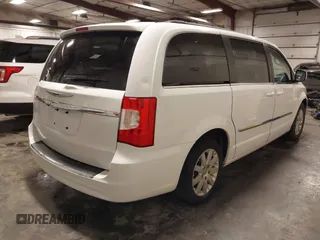 2015 Chrysler Town & Country Touring with VIN 2C4RC1BG9FR626482, listed as a IAAI auction lot 41879865 with 129,694 mi miles and . Bid and sale history available at DreamBid. Image 4.
