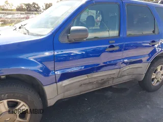 2005 Ford Escape XLS Value with VIN 1FMYU02Z85KD90338, listed as a IAAI auction lot 41916569 with 174,870 mi miles. Bid and sale history available at carsss.com. Image 12.