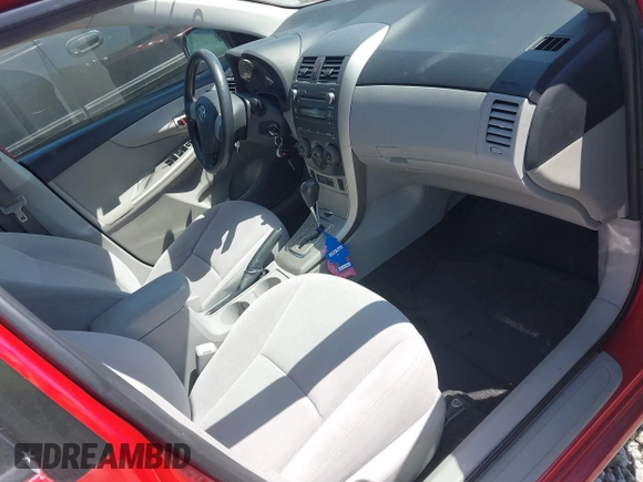 2011 Toyota Corolla L with VIN JTDBU4EE3B9124609, listed as a IAAI auction lot 42046571 with 59,617 mi miles. Bid and sale history available at carsss.com. Image 5.