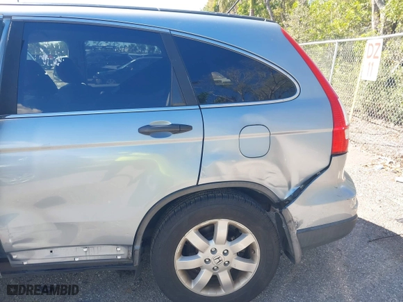 2011 Honda CR-V SE with VIN 5J6RE3H47BL012871, listed as a IAAI auction lot 41661353 with 123,396 mi miles. Bid and sale history available at carsss.com. Image 18.