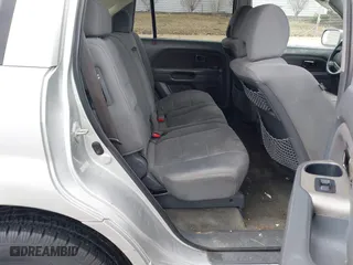 2006 Honda Pilot EX with VIN 2HKYF18426H553632, listed as a IAAI auction lot 41656610 with 154,470 mi miles. Bid and sale history available at carsss.com. Image 8.