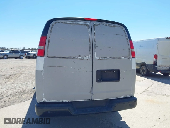 2017 Chevrolet Express Cargo Van with VIN 1GCWGBFFXH1139037, listed as a IAAI auction lot 41784999 with 198,660 mi miles. Bid and sale history available at carsss.com. Image 16.
