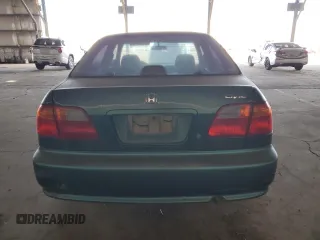2000 Honda Civic VP z VIN 2HGEJ6612YH559659, wystawiony jako Copart lot #42545185 z przebiegiem 220 343 mil mil oraz Czysty tytuł • Clean title. Historia ofert i sprzedaży dostępna na DreamBid. Obrazek 6.