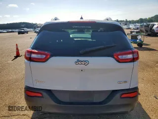 2016 Jeep Cherokee Latitude with VIN 1C4PJLCB8GW125748, listed as a Copart auction lot 60697145 with 118,276 mi miles and Salvage title. Bid and sale history available at DreamBid. Image 6.