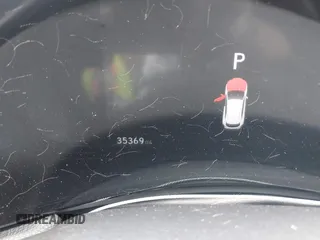 2023 Lexus NX 350h Premium z VIN 2T2GKCEZ2PC010333, wystawiony jako IAAI lot #42641664 z przebiegiem 35 369 mil mil oraz . Historia ofert i sprzedaży dostępna na DreamBid. Obrazek 16.