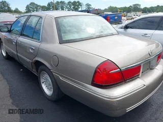 2001 Mercury Grand Marquis LS z VIN 2MEFM75W11X610723, wystawiony jako IAAI lot #42208567 z przebiegiem 190 397 mil mil oraz . Historia ofert i sprzedaży dostępna na DreamBid. Obrazek 3.